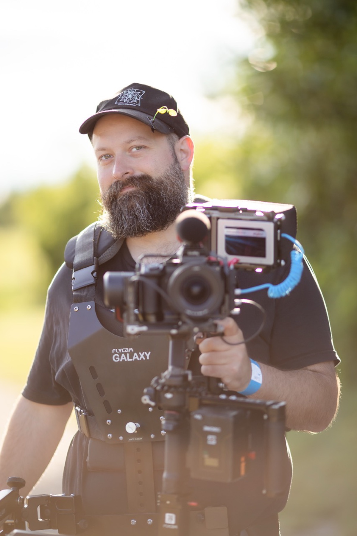 Kia operating a camera rig outdoors at an event.